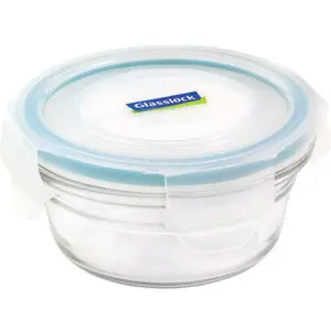 Round glass food storage container with blue-sealed lid.