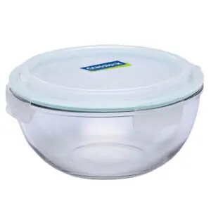 Clear glass mixing bowl with a white plastic lid.